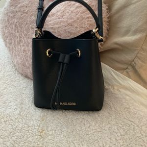 Brand new Suri Small  Saffiano Leather Crossbody Bag, Available only in Black